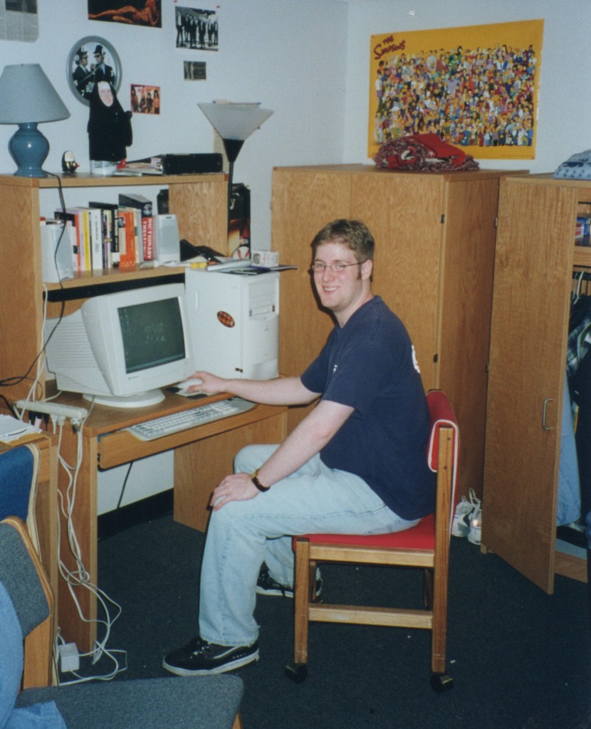Tom in his Marquette dorm room